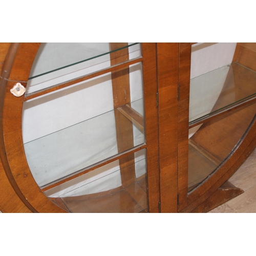 17 - An unusual Art Deco period circular display cabinet with glass shelves, approx 117cm wide x 31cm dee... 