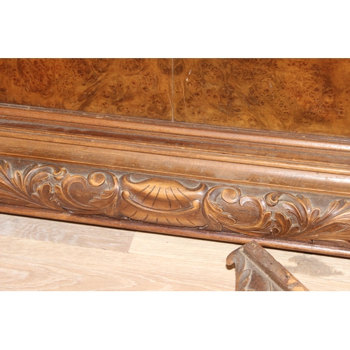 96 - A highly impressive carved wooden double bed, likely early 20th century, consisting of head and foot... 