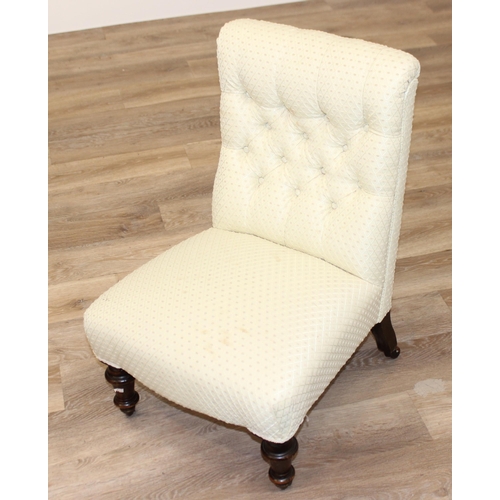 99 - An antique button back nursing chair with cream upholstery, approx 48cm wide x 38cm deep x 72cm tall