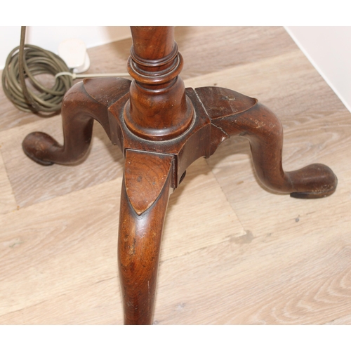 282 - An antique standard lamp with mahogany tripod base and triple bulb fitting, approx 160cm tall