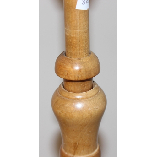 283 - An Art Deco period standard lamp with 2 tone wooden pillar and turned base, approx 157cm tall