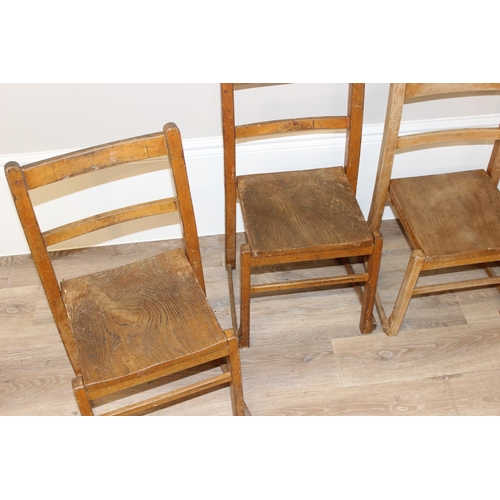 73 - A set of 6 vintage elm stacking children's chairs, the largest approx 65cm tall