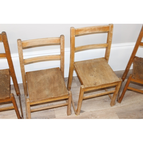 73 - A set of 6 vintage elm stacking children's chairs, the largest approx 65cm tall