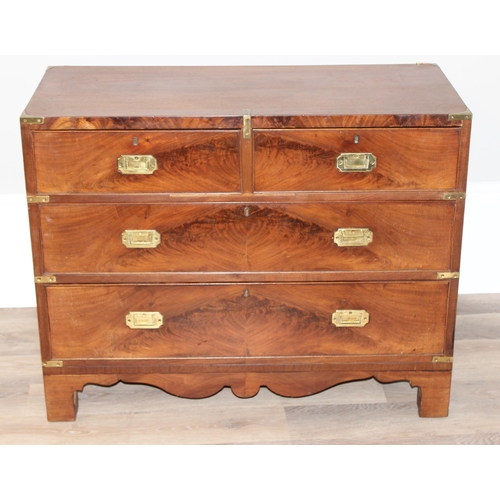 1 - A 19th century mahogany campaign style 2 over 2 chest of drawers, with recessed brass handles and br... 