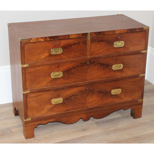 1 - A 19th century mahogany campaign style 2 over 2 chest of drawers, with recessed brass handles and br... 