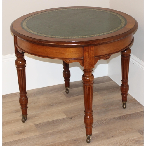 2 - A superb quality 19th century circular library table with gilt tooled green leather top, reeded colu... 