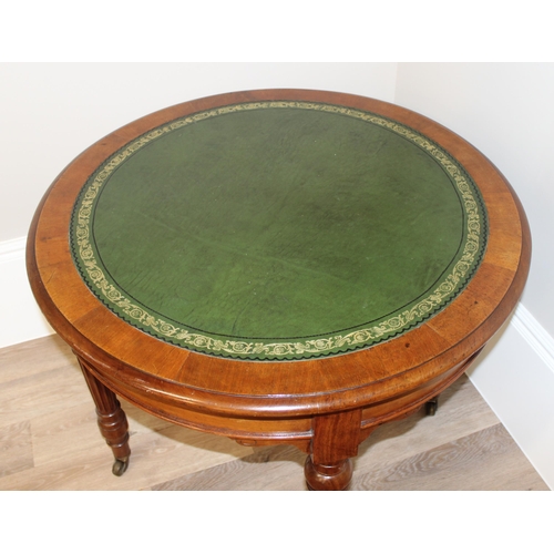 2 - A superb quality 19th century circular library table with gilt tooled green leather top, reeded colu... 