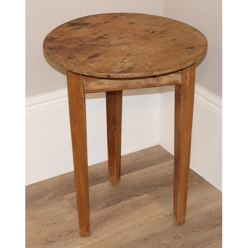 56 - An antique circular topped pine cricket table, approx 52cm diameter x 68cm tall