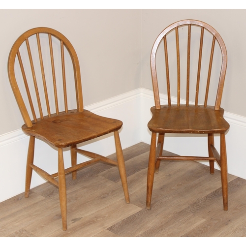 50 - A pair of retro Ercol hoop back dining chairs, approx 87cm tall