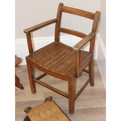 100 - A vintage slatted armchair, Arts & Crafts period seagrass topped footstool and a small Indian carved... 