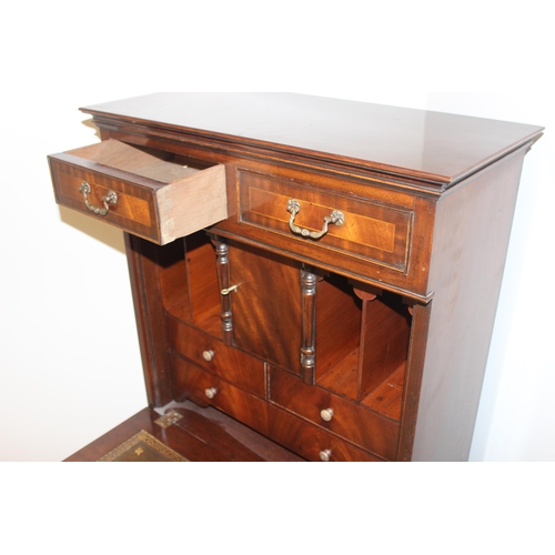 14 - An antique style mahogany fall front bureau or writing desk, approx 63cm wide x 45cm deep x 136cm ta... 