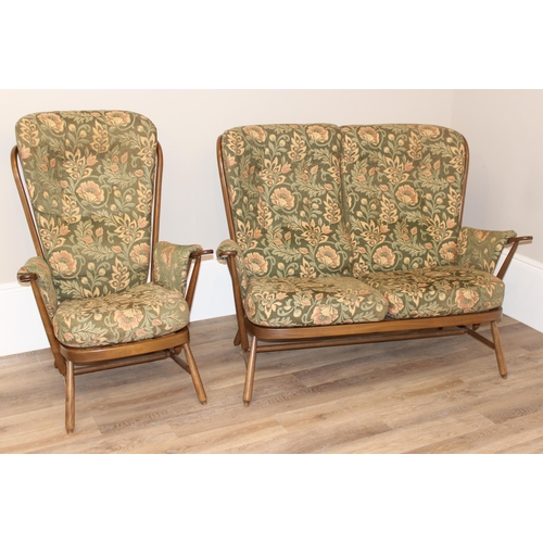 24 - Ercol floral patterned 2 seater sofa and 2 similar chairs, sofa approx 140cm wide x 85cm deep x 103c... 