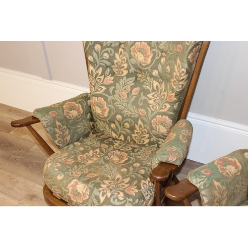 24 - Ercol floral patterned 2 seater sofa and 2 similar chairs, sofa approx 140cm wide x 85cm deep x 103c... 