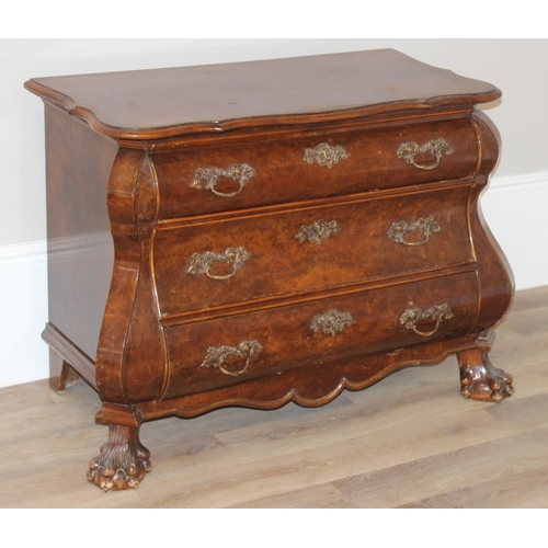 9 - A 19th century Dutch walnut bombe shaped chest, quarter-veneered serpentine top above 3 long convex,... 