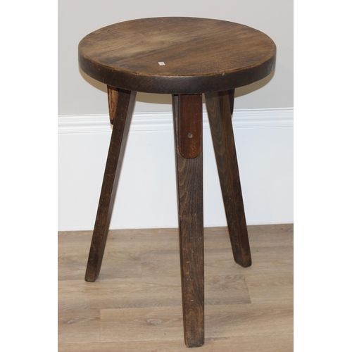 58 - A small vintage circular topped oak side table with 3 legs, approx 46cm wide x 46cm deep x 67cm tall