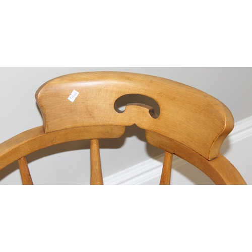 51 - A vintage elm seated smokers bow chair, approx 55cm wide x 55cm deep x 81cm tall