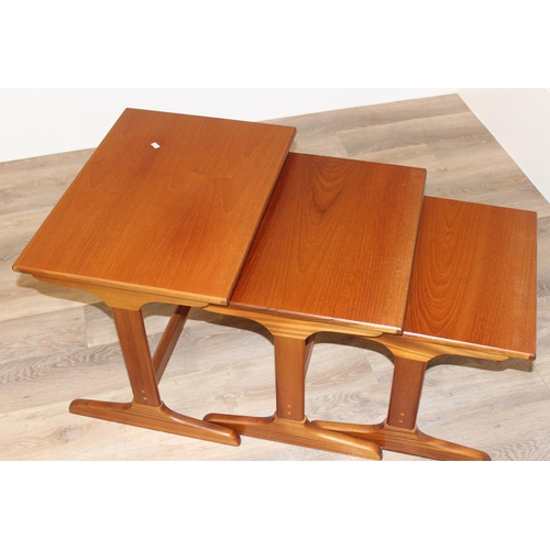 32 - A retro G-Plan style nest of tables, seemingly unmarked, largest approx 58cm wide x 42cm deep x 48cm... 