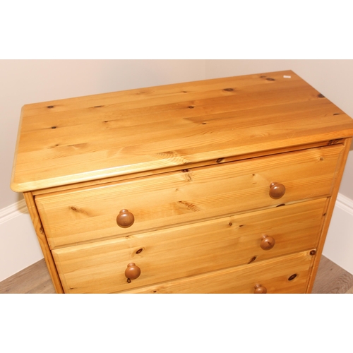 40 - A modern pine 4 drawer chest of drawers, approx 85cm wide x 40cm deep x 98cm tall