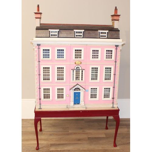 107 - Brian Stone of Wallingford - a very large bespoke made dolls house on stand formed as a Georgian tow... 