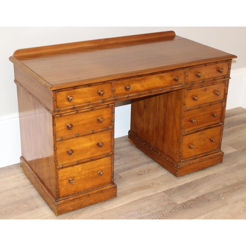 5 - Howard & Sons - a rare 19th century pedestal desk, the moulded rectangular top above a kneehole rece... 