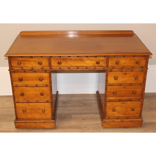 5 - Howard & Sons - a rare 19th century pedestal desk, the moulded rectangular top above a kneehole rece... 