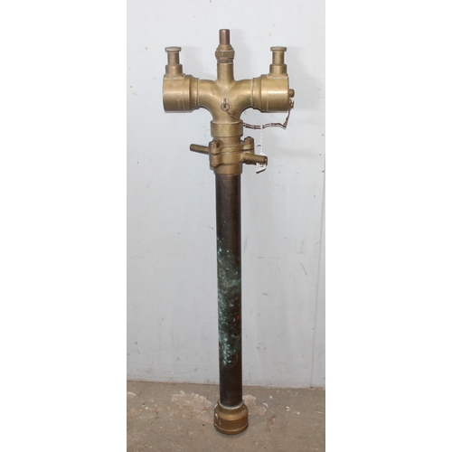 1410 - A vintage brass and copper firehose splitter by Merryweather of London, approx 110cm tall