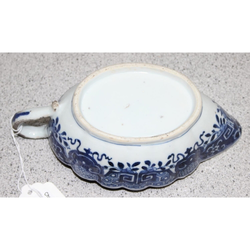 1765 - An antique Chinese blue and white gravy boat of ribbed form, likely 19th century, approx 20cm long