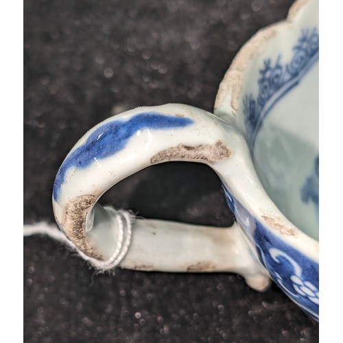 1765 - An antique Chinese blue and white gravy boat of ribbed form, likely 19th century, approx 20cm long