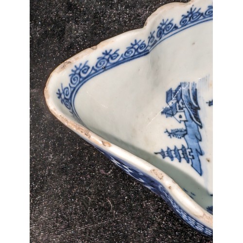 1765 - An antique Chinese blue and white gravy boat of ribbed form, likely 19th century, approx 20cm long