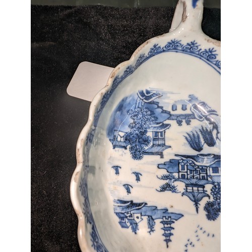 1765 - An antique Chinese blue and white gravy boat of ribbed form, likely 19th century, approx 20cm long