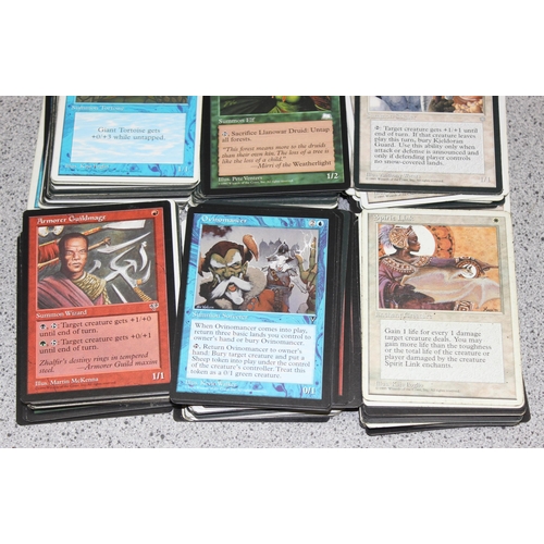 611 - Single owner collection - A box of different coloured Magic the Gathering cards mostly from the 90's... 