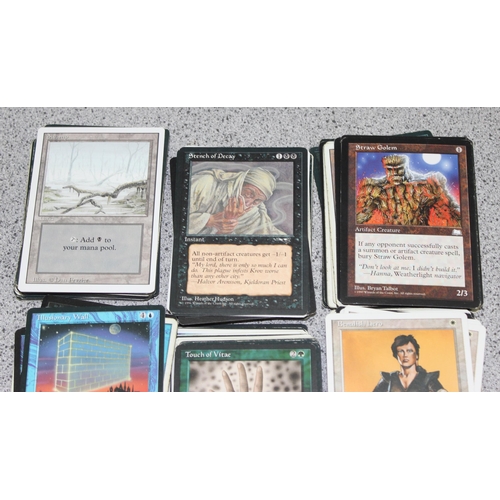 611 - Single owner collection - A box of different coloured Magic the Gathering cards mostly from the 90's... 