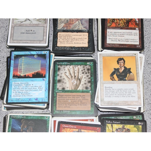 611 - Single owner collection - A box of different coloured Magic the Gathering cards mostly from the 90's... 