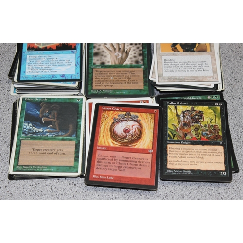 611 - Single owner collection - A box of different coloured Magic the Gathering cards mostly from the 90's... 