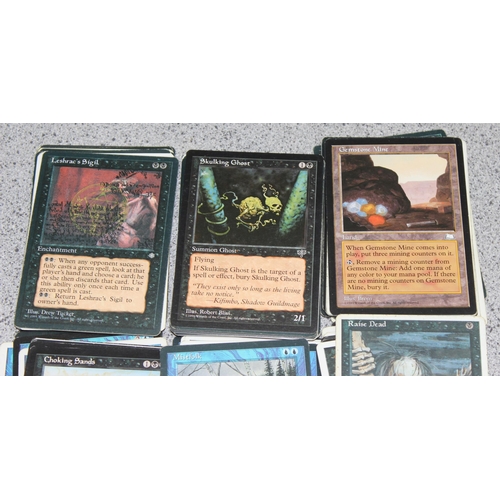 611 - Single owner collection - A box of different coloured Magic the Gathering cards mostly from the 90's... 