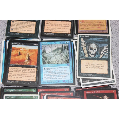 611 - Single owner collection - A box of different coloured Magic the Gathering cards mostly from the 90's... 