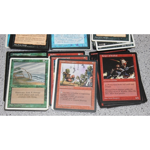 611 - Single owner collection - A box of different coloured Magic the Gathering cards mostly from the 90's... 