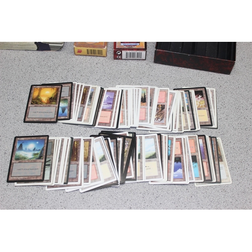 611 - Single owner collection - A box of different coloured Magic the Gathering cards mostly from the 90's... 