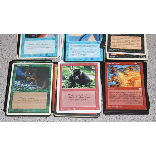 611 - Single owner collection - A box of different coloured Magic the Gathering cards mostly from the 90's... 