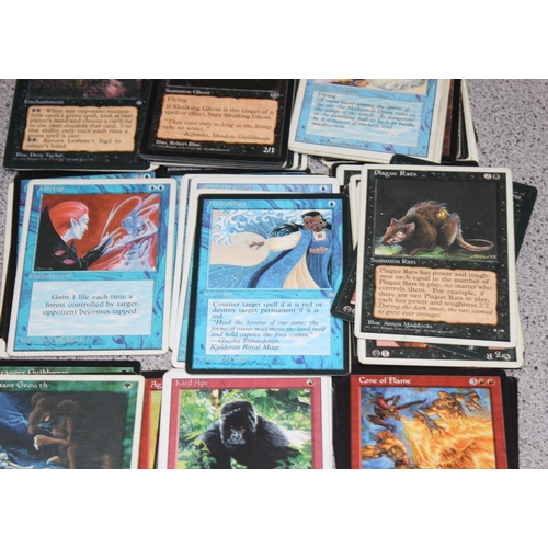 611 - Single owner collection - A box of different coloured Magic the Gathering cards mostly from the 90's... 