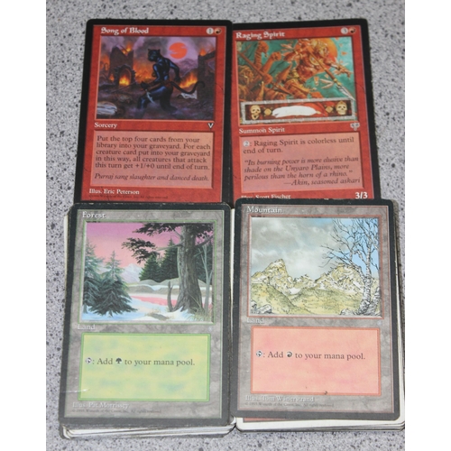 611 - Single owner collection - A box of different coloured Magic the Gathering cards mostly from the 90's... 