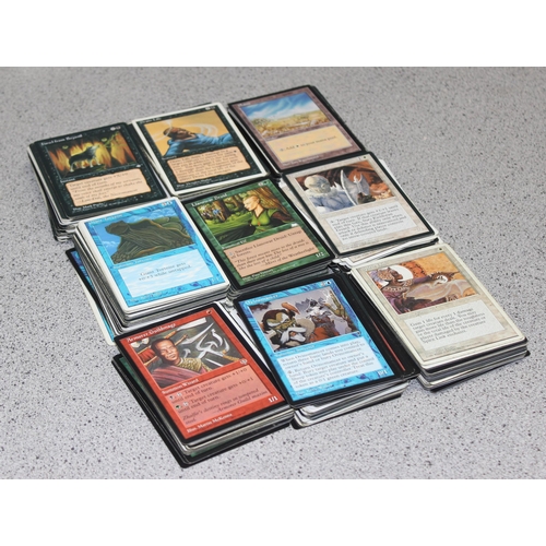 611 - Single owner collection - A box of different coloured Magic the Gathering cards mostly from the 90's... 