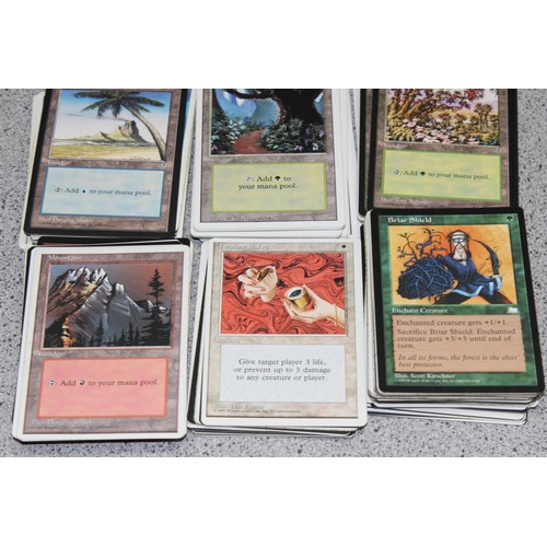 611 - Single owner collection - A box of different coloured Magic the Gathering cards mostly from the 90's... 