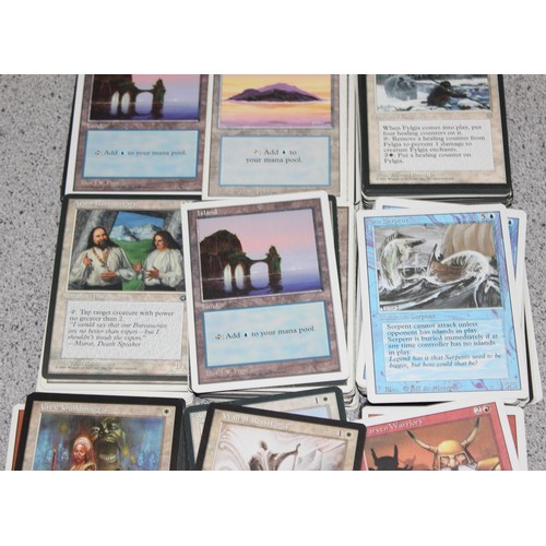 611 - Single owner collection - A box of different coloured Magic the Gathering cards mostly from the 90's... 