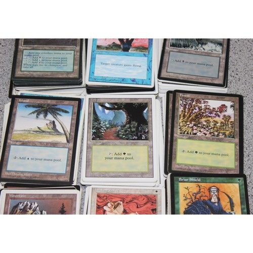 611 - Single owner collection - A box of different coloured Magic the Gathering cards mostly from the 90's... 