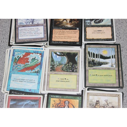 611 - Single owner collection - A box of different coloured Magic the Gathering cards mostly from the 90's... 