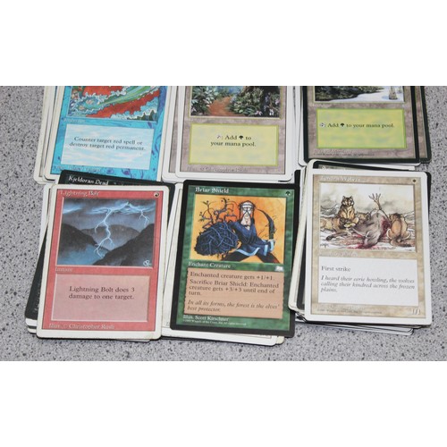 611 - Single owner collection - A box of different coloured Magic the Gathering cards mostly from the 90's... 