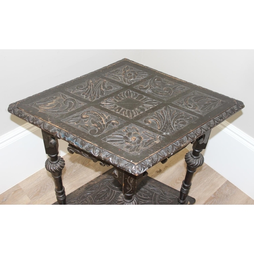 178 - A 17th century style heavily carved dark oak side or hall table with diamond shaped top, approx 80 x... 