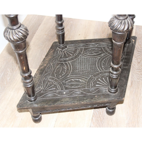 178 - A 17th century style heavily carved dark oak side or hall table with diamond shaped top, approx 80 x... 