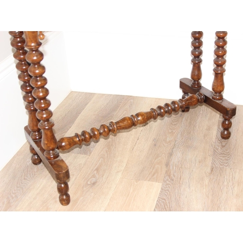 180 - Antique mahogany hall table with inlaid butterfly details and bobbin turned legs and support beam, a... 